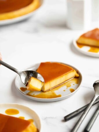 A plate with a slice of flan
