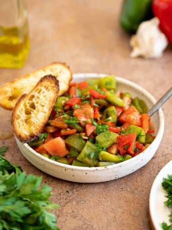 a bowl of roasted pepper salad