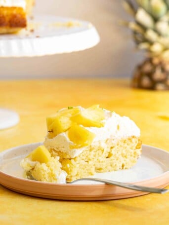 a slice of pina colada cake