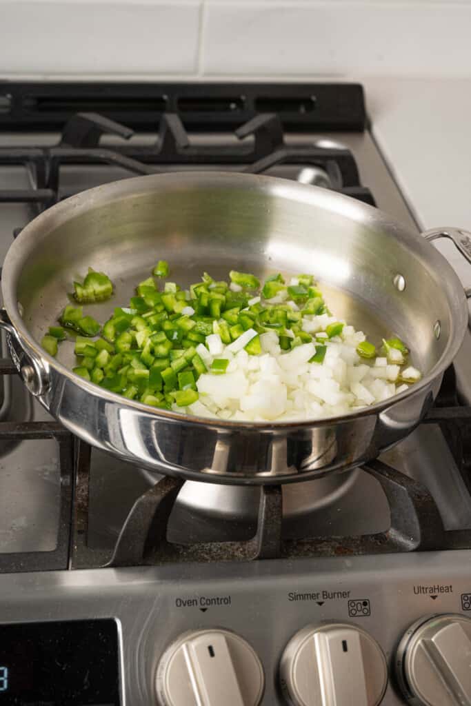 a pot of onions and peppers