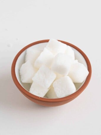 a bowl of sugar cubes