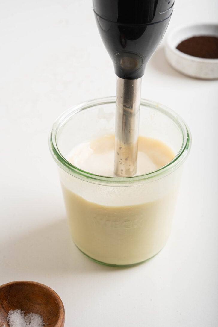 Honey, milk, and tahini being frothed.