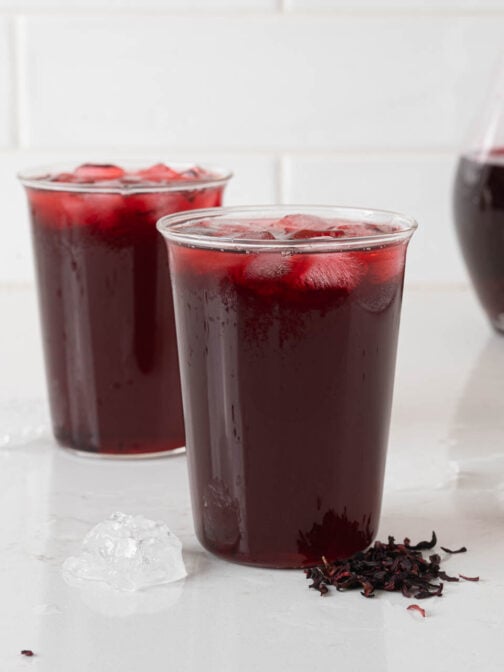 Glasses of agua de jamaica.