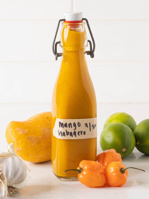 A bottle of mango habanero hot sauce.