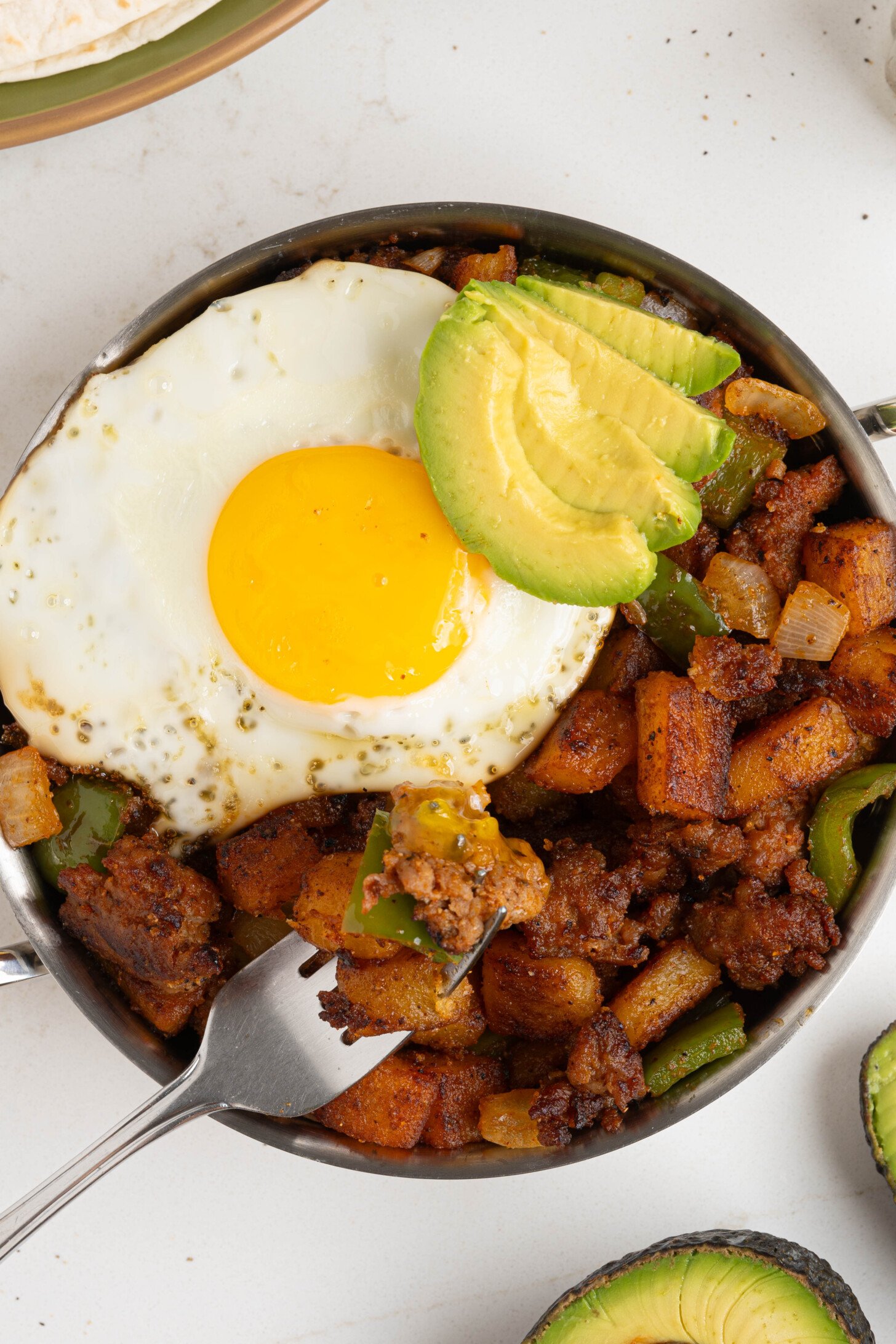 Korezo Breakfast has hadh in a skillet.
