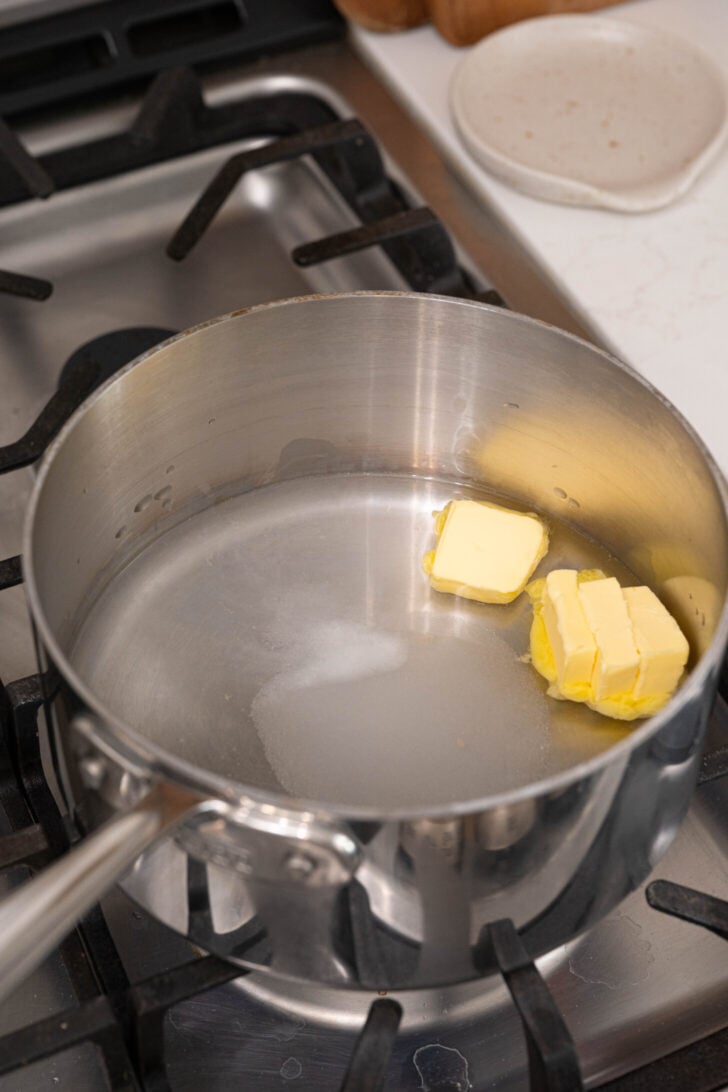 Butter, water, sugar and salt in a pot.