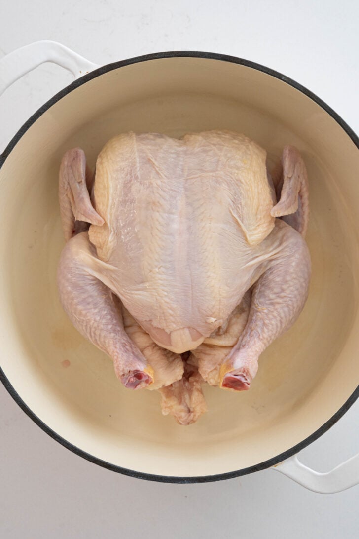 A dry raw poultry in a pot.