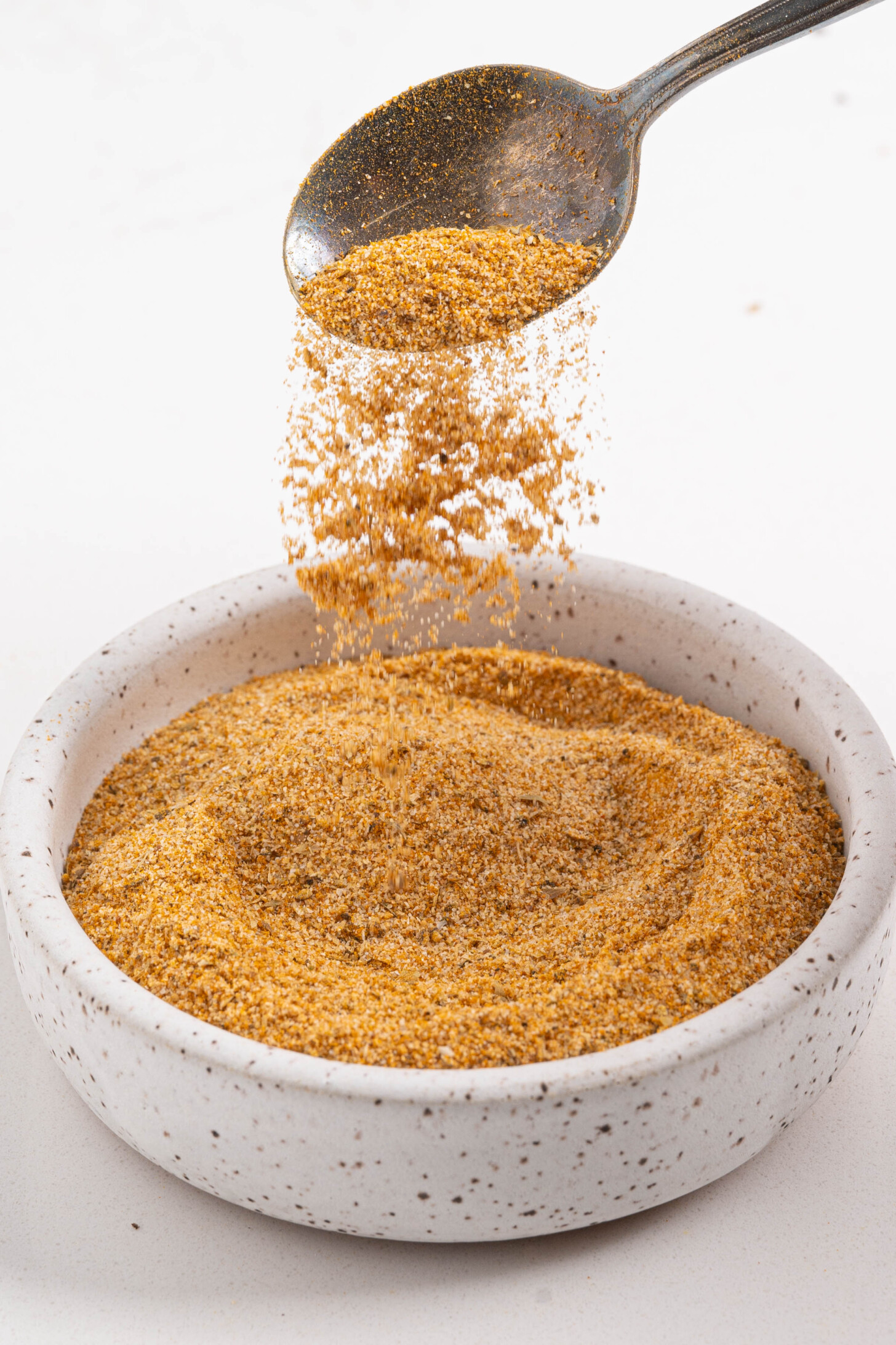 A bowl of adobo seasoning.