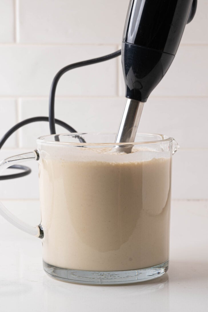 Coquito being blended together.