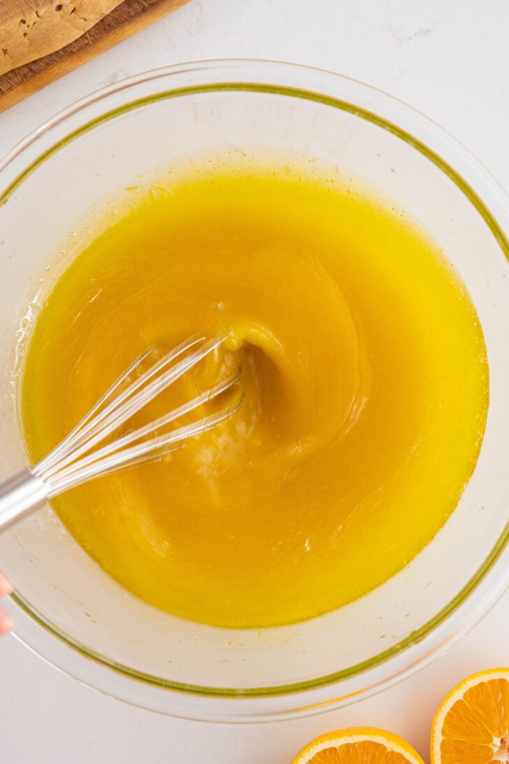 The wet ingredients are being thrown together.
