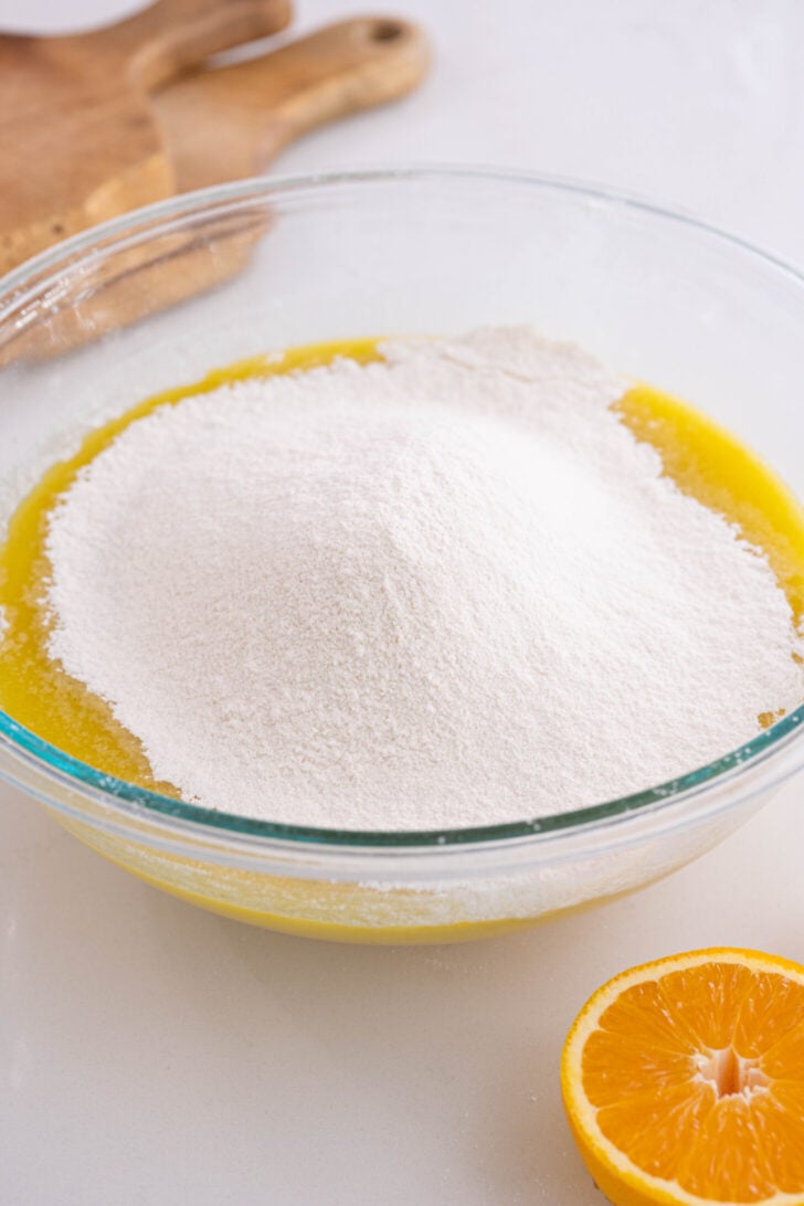 The dry ingredients are layered over the wet ingredients.