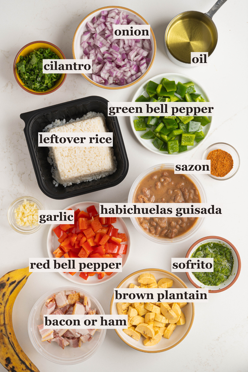 Bowls of oil, onion, peppers, beans and more.