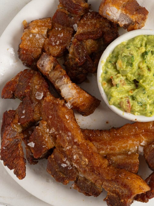 Crispy chicharrones on a plate.