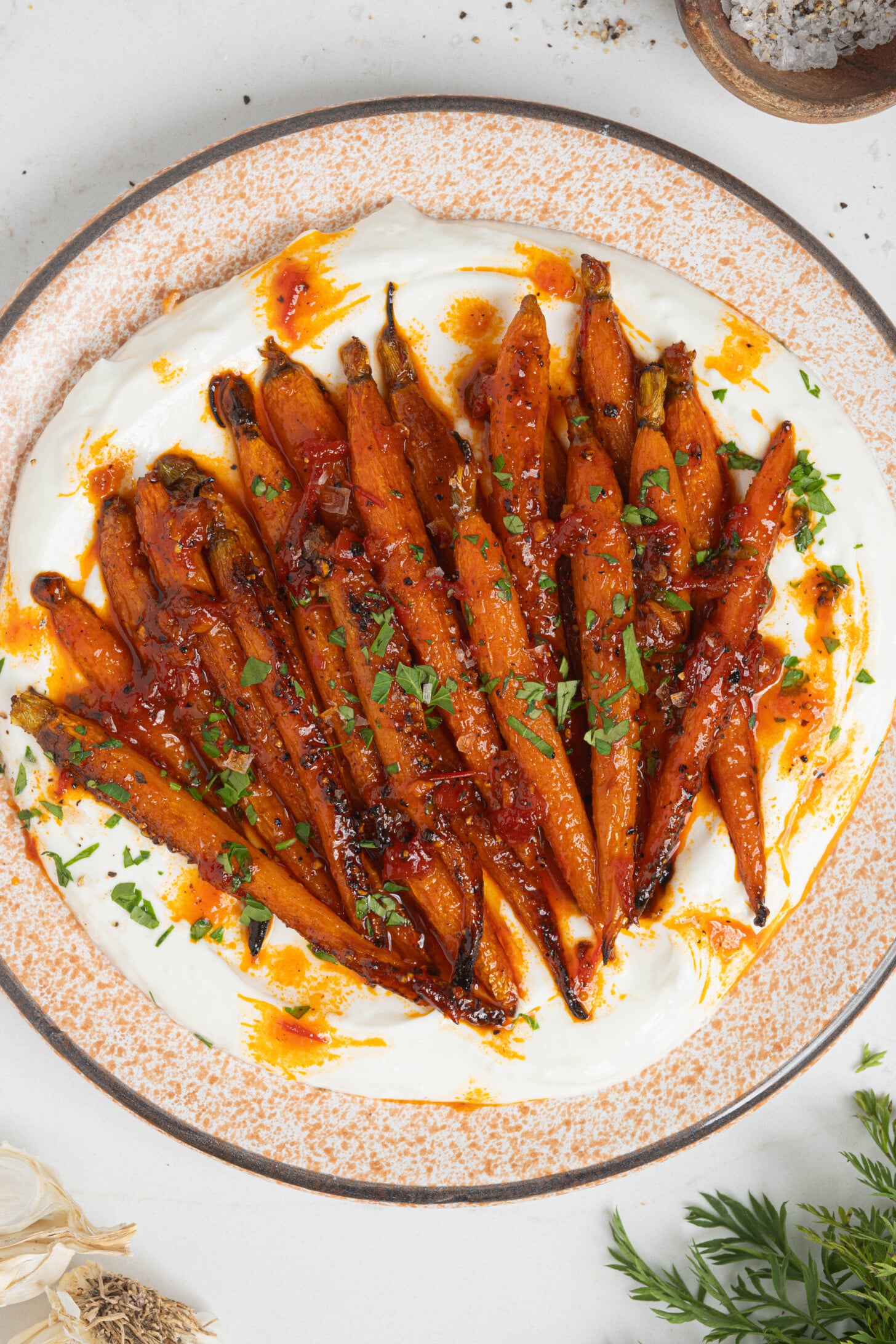 Harissa honey roasted carrots on a plate.