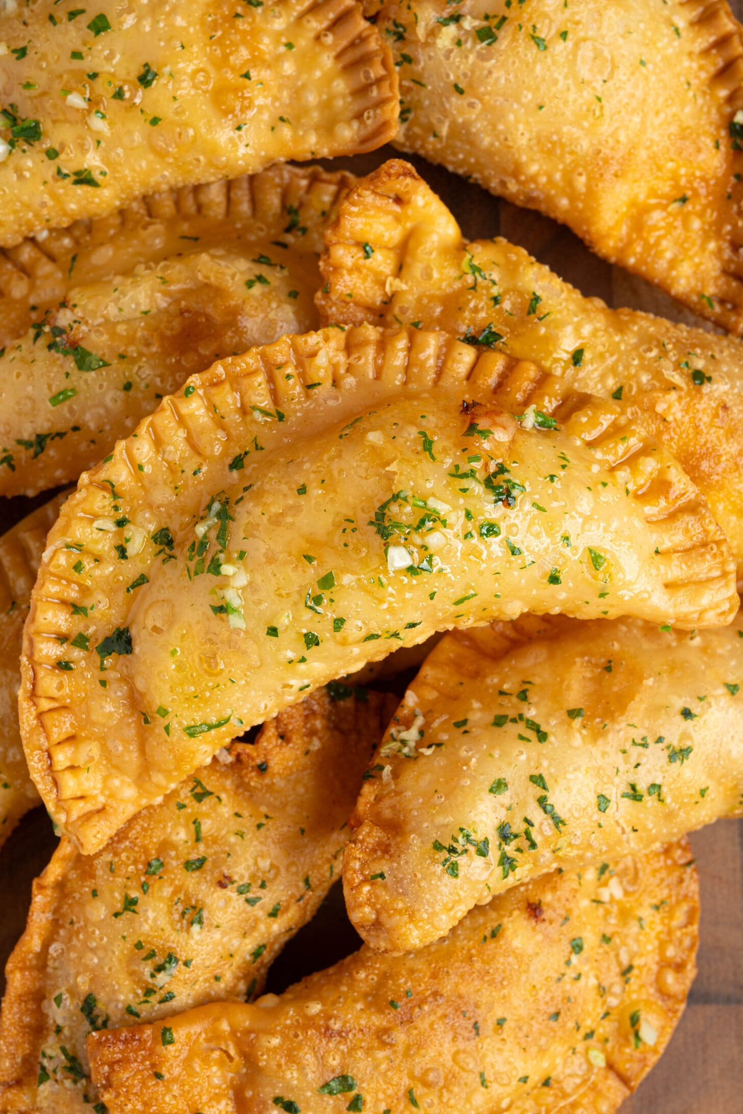 Pizza empanadas on a plate.