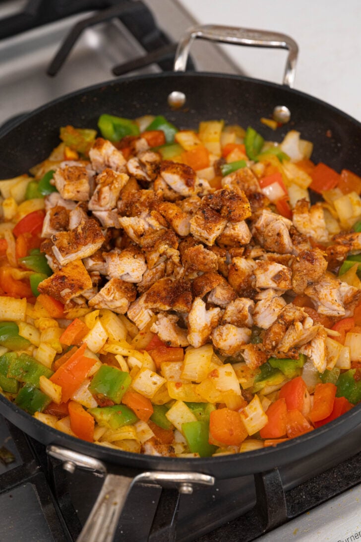 Chicken empanada filling in a pan.