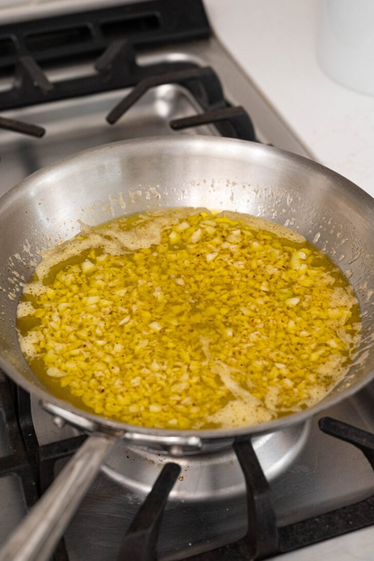A pan of garlic mojo sauce.
