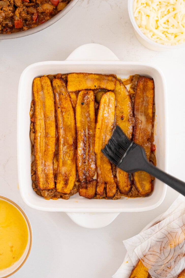 A pastelon being assembled.