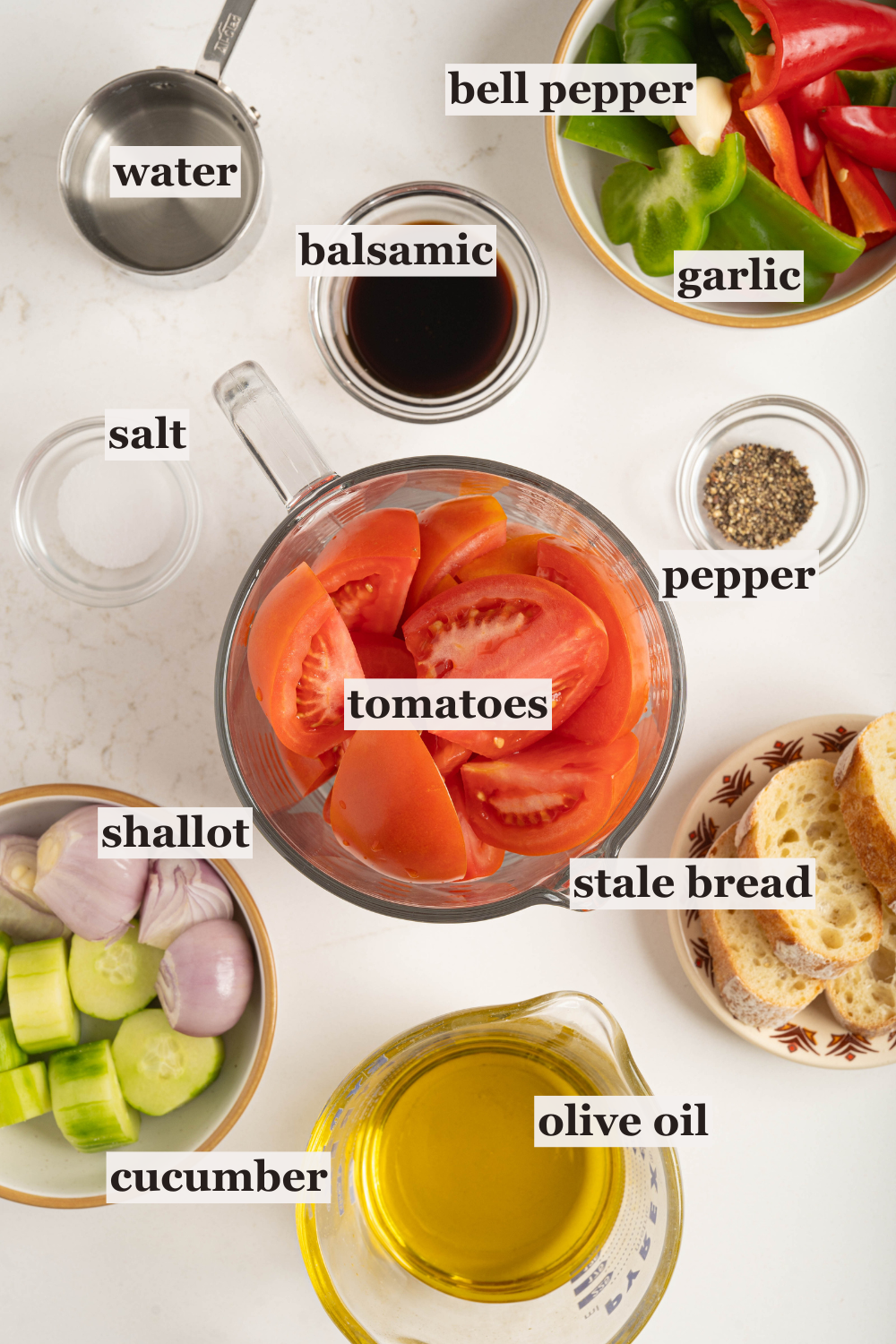 Bowls of tomatoes, peppers, oil and more.