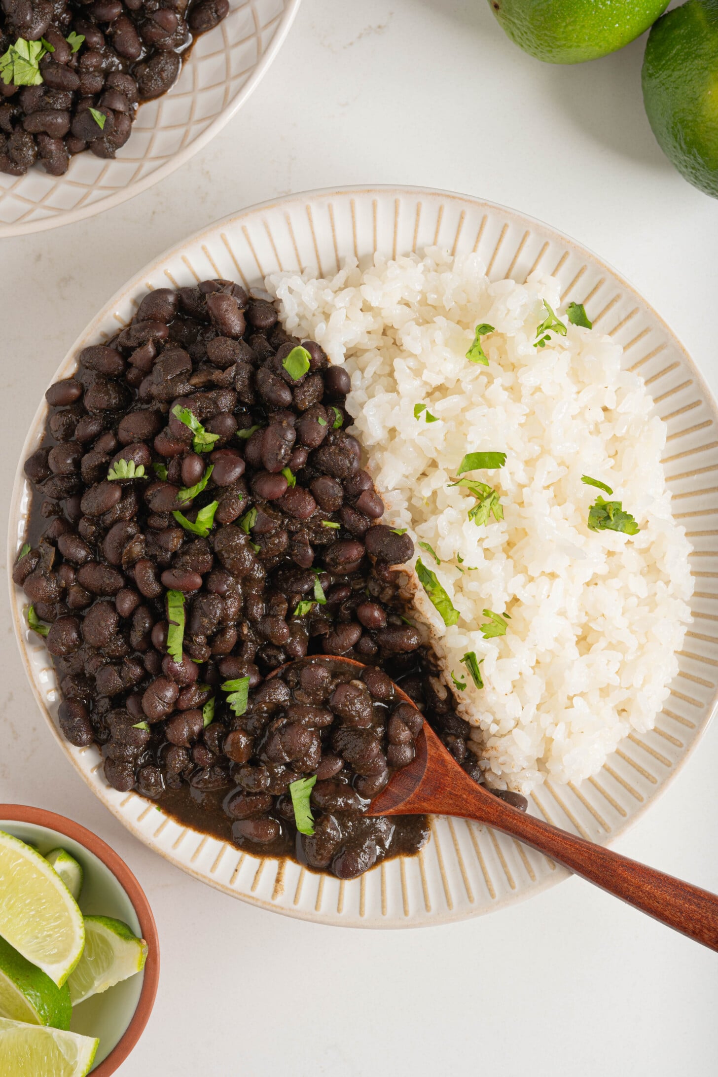 A plate of habichuelas negras with rice.