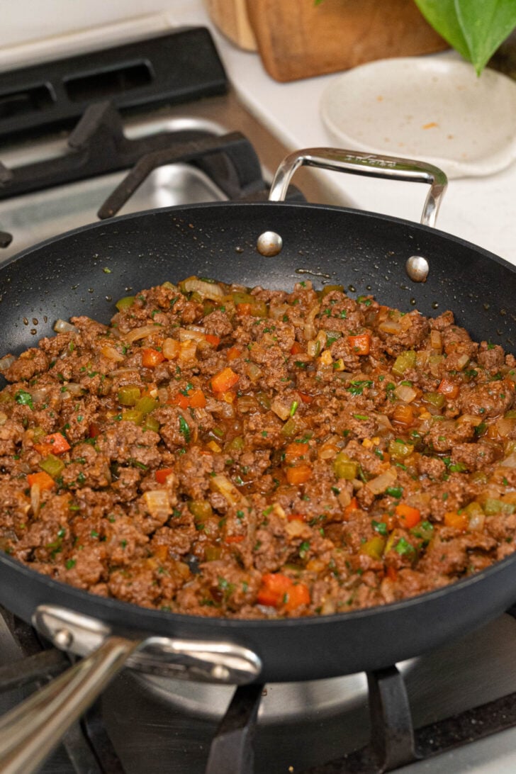 A pan with spiced ground beef filling.