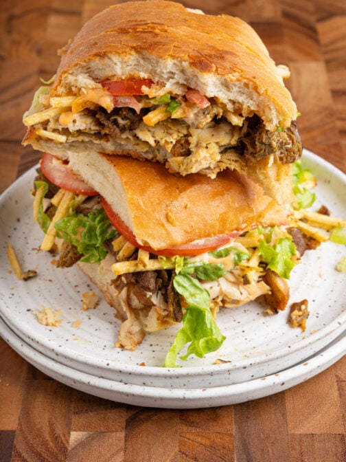 A tripleta sandwich on a plate.