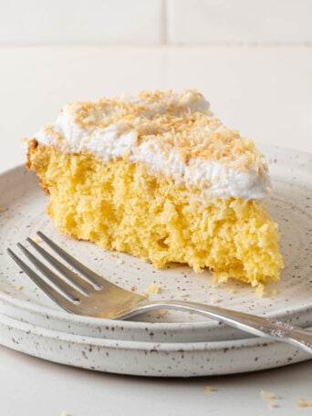 A pina colada cake on a plate.
