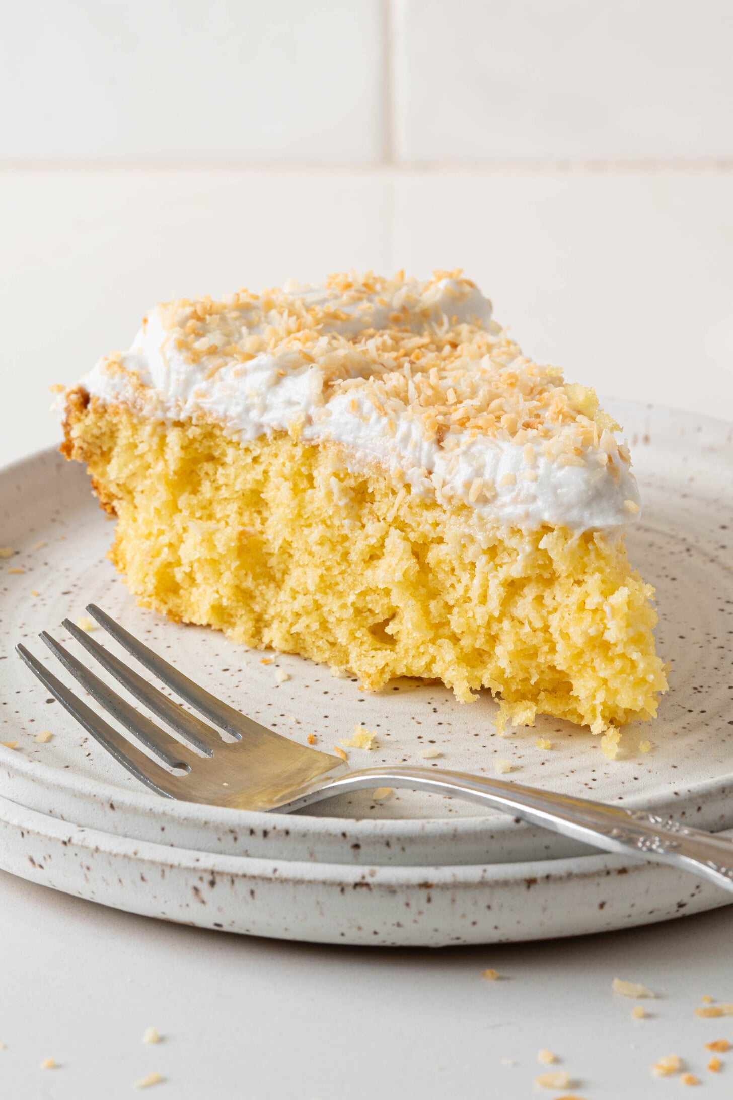 A pina colada cake on a plate.