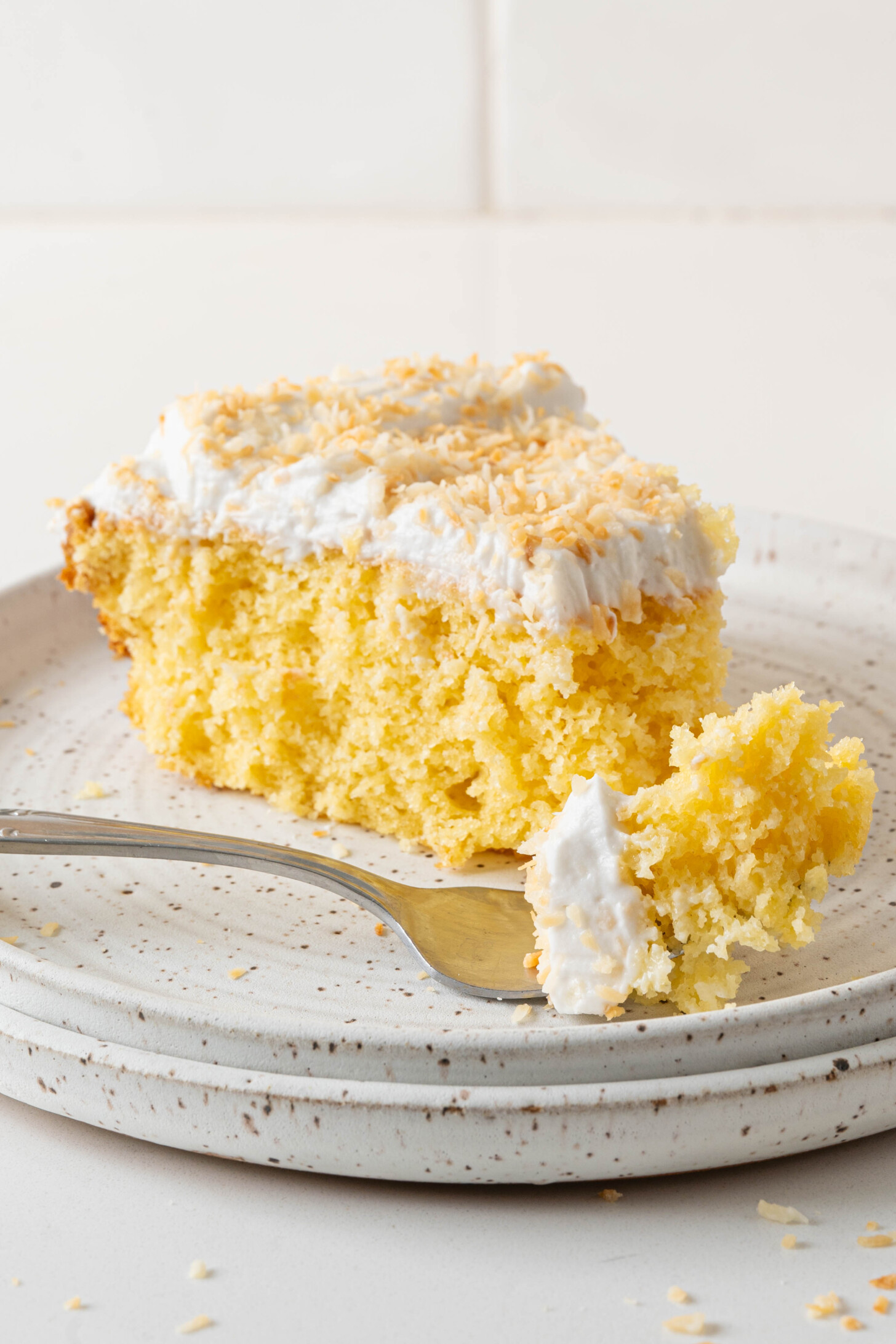 A pina colada cake on a plate.