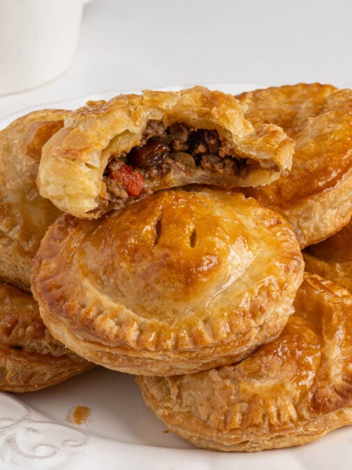 A plate of pastelitos de carne.